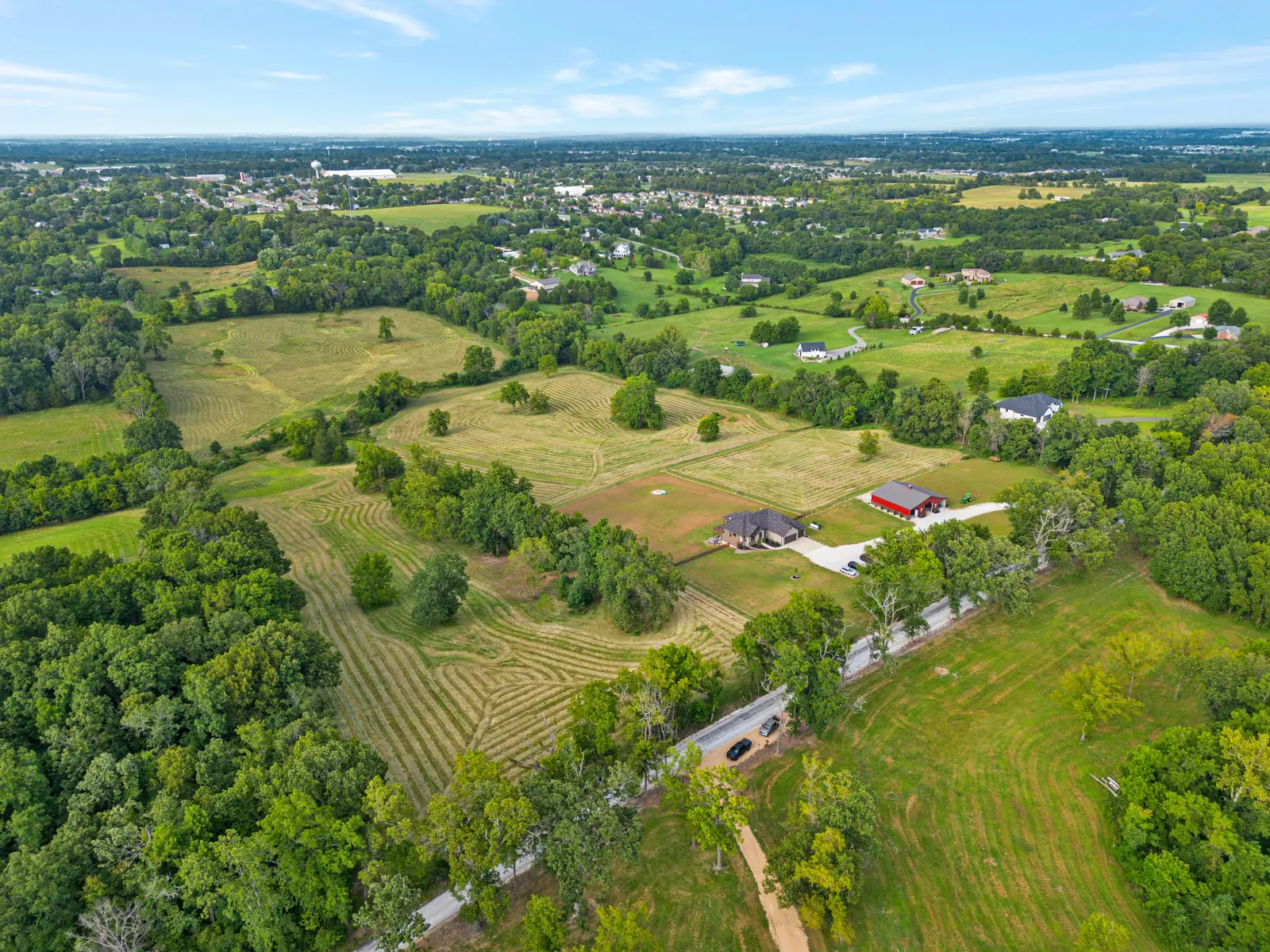 Aerial view of open acreage outlined among farmland